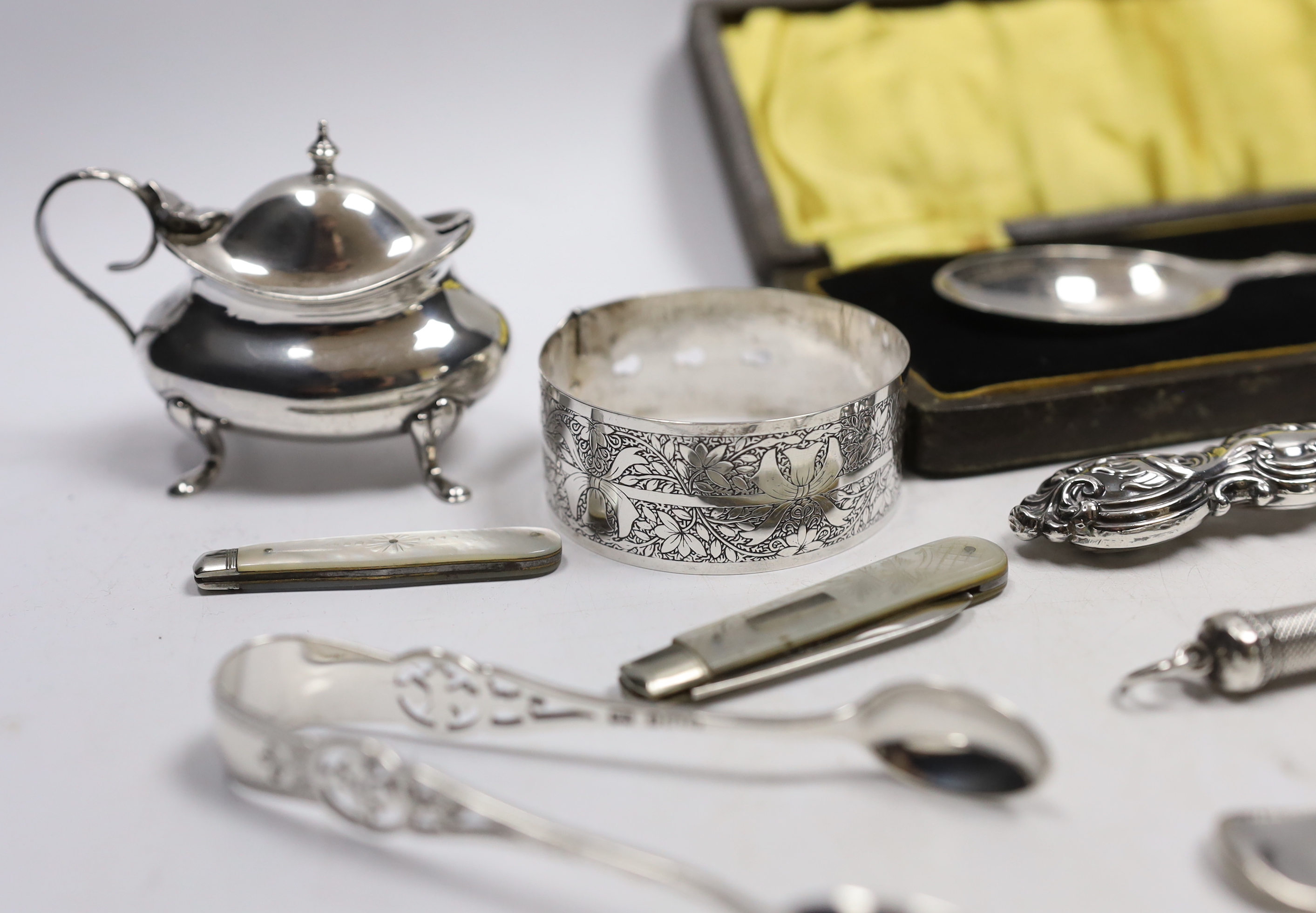 Sundry small silver including bracelet, dessert spoon, fruit knives, mustard, vesta pill box, sterling spoon, butter knife, etc.